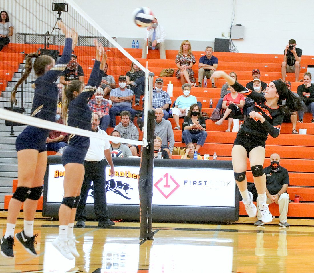 Mattie Larsen sends the ball over the net and two Cody blockers during the Panthers’ Thursday evening home loss to the Fillies. The Powell High School girls traveled to Buffalo on Saturday for a pair of matches.