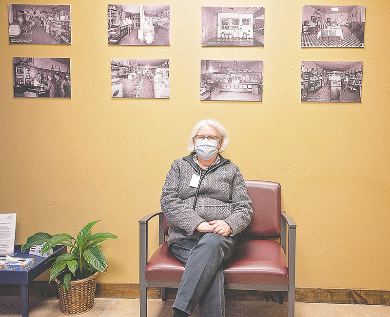 A panel of photographs from early day Powell lines the lobby wall in evidence of the spirit of Heritage Health Center.  Dr. Juanita Sapp, who has been Chief Medical Officer of HHC since its opening, is stepping down from that role, but will remain a clinic physician.