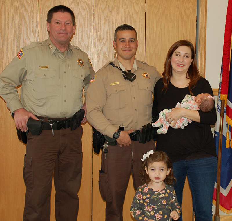 Park County Undersheriff Andy Varian of Cody poses for a photo alongside his wife, JoEllen, two of his children and Sheriff Scott Steward after his recent promotion. Varian, who had been serving as a sergeant, replaces longtime Undersheriff Tom Ehlers.