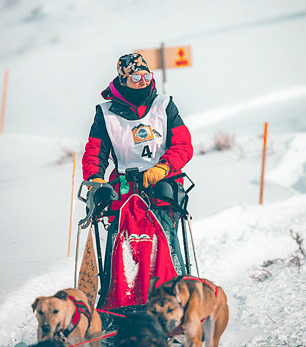 Anny Malo (Bib 4) from Quebec, Canada, finished leg four of the Pedigree Stage Stop sled dog race in first place, with a time of 2 hours, 21 minutes and 3 seconds.