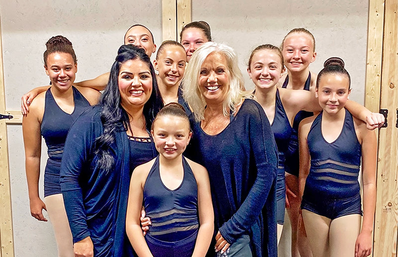 Personnel at Victoria’s School of Dance pose with Marcea Lane, who was a lead dancer for Michael Jackson’s ‘Thriller’ video. Pictured from left are, back row: Raven Tobin, Delaney Jackson, Anne Aguirre and Peyton Hamilton; middle row: Victoria Danovsky, Anna Smith, Marcea Lane, Caitlin Belmont and Makenzie Reidinger; front row: Demi Danovsky.