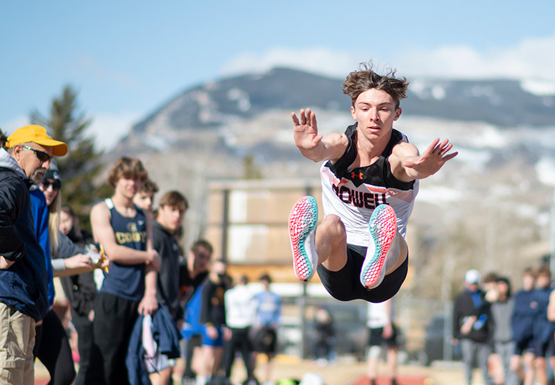 Freshman Isaiah Woyak competes in the long jump Saturday in Powell’s first meet of the 2021 season. Woyak finished 15th in the event with a distance of 17-05.50.