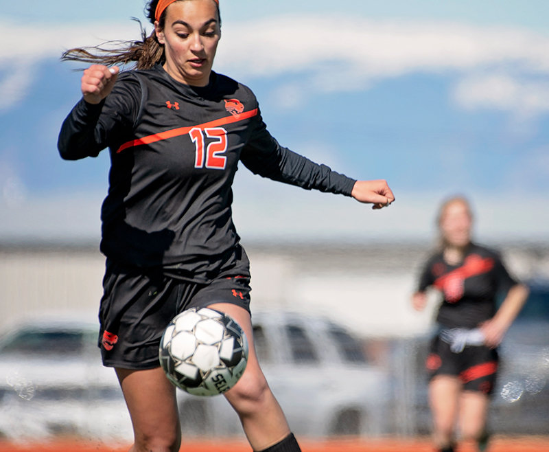 PHS freshman Kenzie Fields attempts to control a ball Friday in Powell’s 9-0 loss to Lander Valley. Despite the wide margin, head coach Kaitlin Loeffen was pleased with her team’s performance and noticed improvement from the girls.