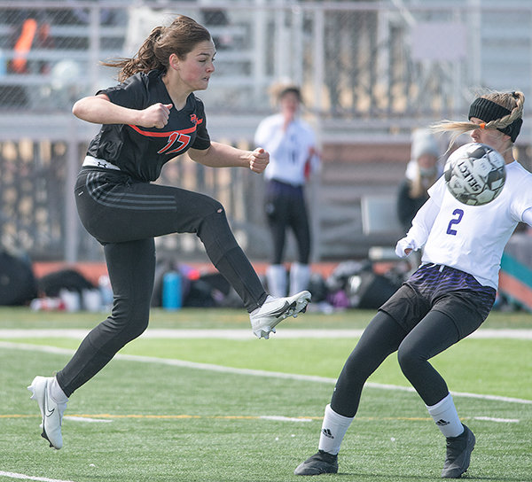 Jaedyn Hampton boots a ball Friday in the Panthers’ loss to Mountain View. Despite dropping both contests last weekend, the team showed development on offense, posting more shots on goal.