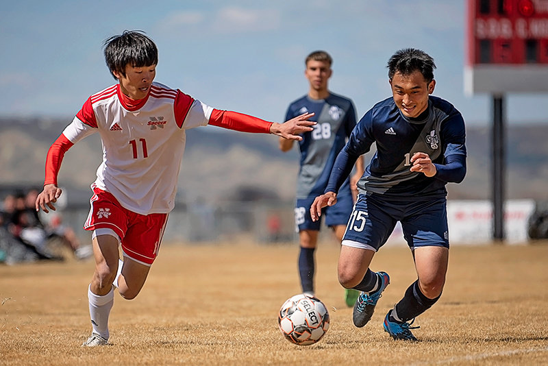 Taisei Goto (left) plays defense Saturday against Otero. NWC head coach Rob Hill hopes the team uses its most recent losses as a learning experience as it dives into the heat of the season.