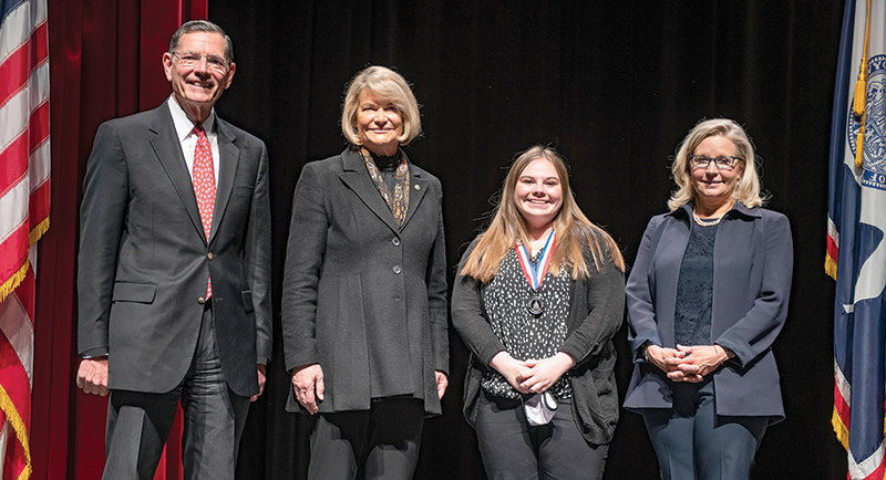 From left, U.S. Sens. John Barrasso and Cynthia Lummis (R-Wyo) and U.S. Rep. Liz Cheney present the Congressional Award to Kaitlyn Beavers. The medal ceremony was held at the Cheyenne Civic Center on Sunday.