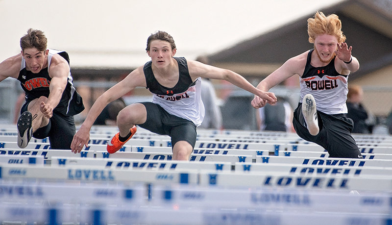 Hyrum Jeide, Simon Shoopman and Eli Weimer compete in the 110 hurdles Saturday. Shoopman, Jeide and Weimer placed fourth, fifth and sixth, respectively.
