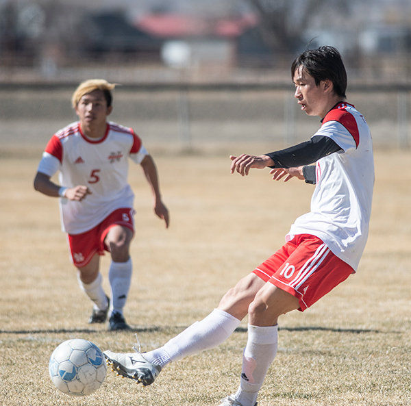 Haruki Yamazaki strikes a penalty kick for Northwest College’s third goal on April 21. The 4-2 win was the first of two Trapper victories, allowing them to eclipse .500 on the season.