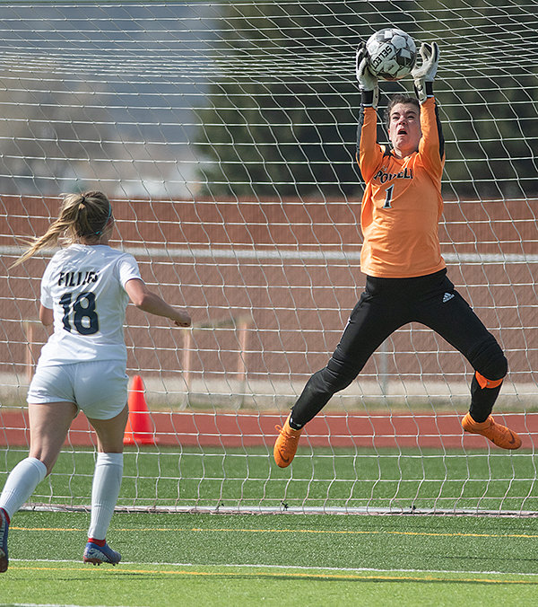 Mattie Larsen makes a save Thursday in Powell’s 7-0 loss to Cody. Larsen played both in goal and in the field in the senior night match.