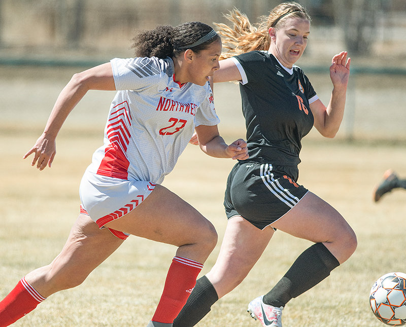 NWC sophomore Kierra Cutright runs toward a ball against CWC earlier in the season. Despite just a two-day offseason between women’s basketball and soccer, Cutright currently leads NWC in scoring.