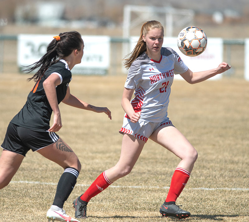 Brooke Leidholt goes for a ball in a match against Central Wyoming. Leidholt joined the soccer squad after the livestock judging team completed its 2021 season.