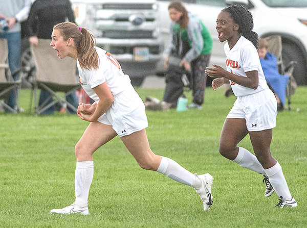 Jaedyn Hampton (left) celebrates with Kalaiah Stenlund after scoring a goal late in Friday’s match against Worland. The score sparked energy from the Panthers and previewed what the program can achieve in the near future.