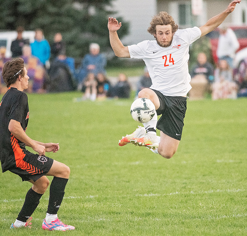 Matthew Hobbs leaps into the air to stop a ball against Worland on Friday. The Panthers showed ‘grit’ after falling in a two-goal deficit early, their coach said, scoring two goals in a row.