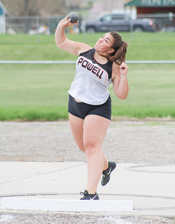 Reagan Thompson tosses the shot put at regionals on Saturday. She finished second in the event with a distance of 27 feet, 8.5 inches.