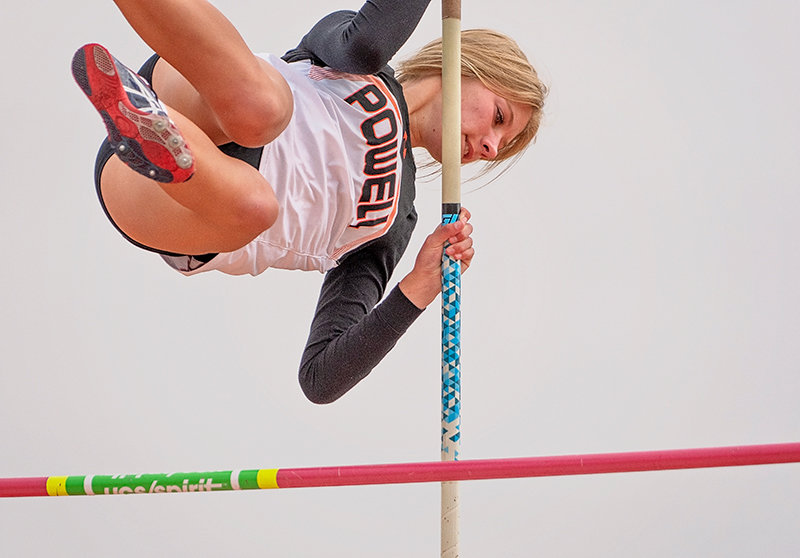 Lauryn Bennett sails over the bar during pole vaulting. Bennett topped out at 8 feet, 6 inches, earning a seventh-place finish.