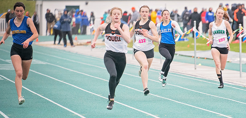 Jenna Hillman leads the pack in the 200 with Waycee Harvey following closely behind.