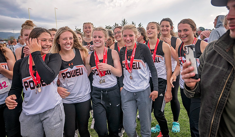 Kami Jensen, Abigail Urbach, Jenna Hillman, Lauryn Bennett, Anna Bartholomew, Katie O’Brien and Sydney Spomer celebrate the 3A girls’ State Track and Field Championships. A handful of first-place finishes and other strong performances allowed the team to run away with the title.