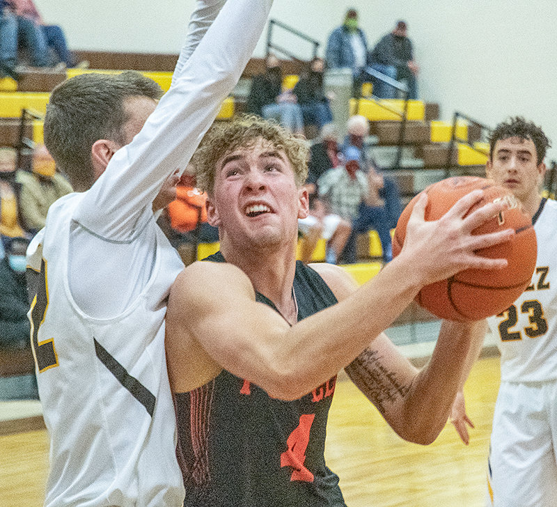 Mason Marchant attempts a layup against Rocky Mountain on Jan. 9. The recent PHS grad was one of 10 boys’ basketball players selected to represent Wyoming in the Montana-Wyoming All-Star Basketball Series.