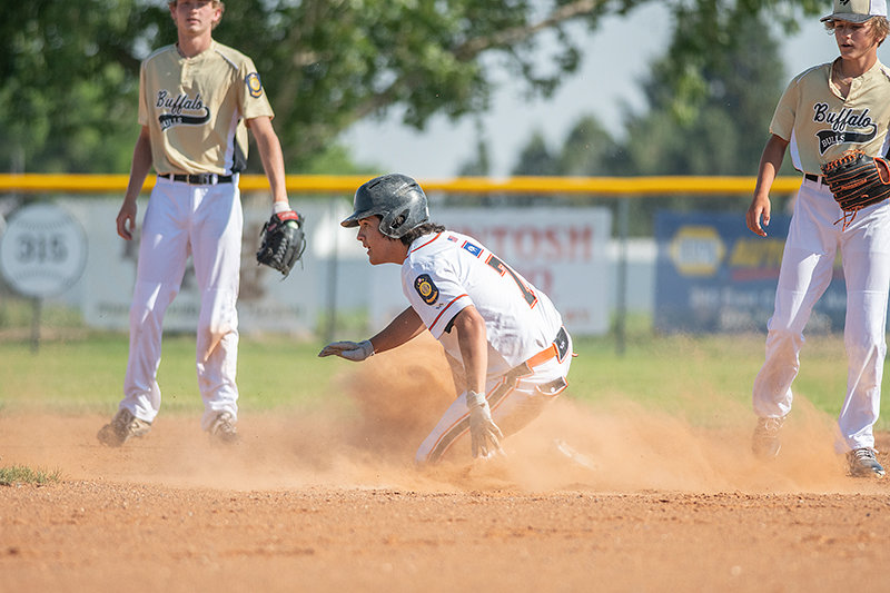 Kolt Flores slides into second base after advancing on a passed ball in Wednesday’s doubleheader against Buffalo. Flores stood out at the plate, logging three hits in the first game.