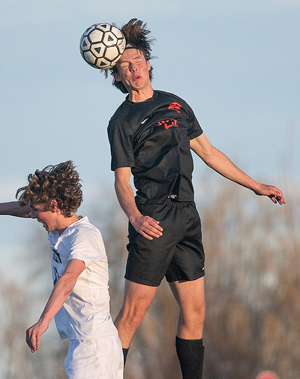 Landon Sessions goes for a header against Cody on April 29. Sessions, a defender, looks forward to once again working with PHS head coach David Gilliatt, who is an assistant on the Northwest College staff.