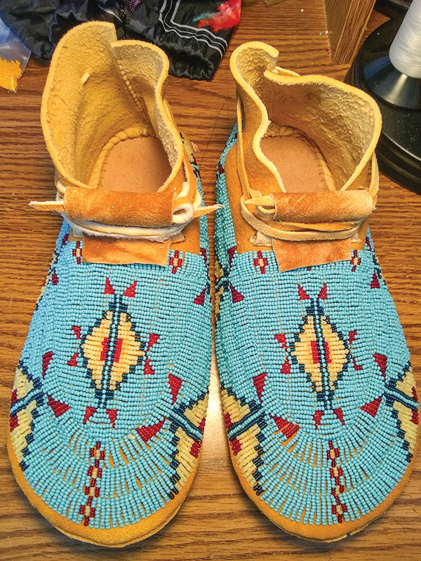 Charles Dewey (Northern Arapaho) of Arapahoe made these beaded moccasins.