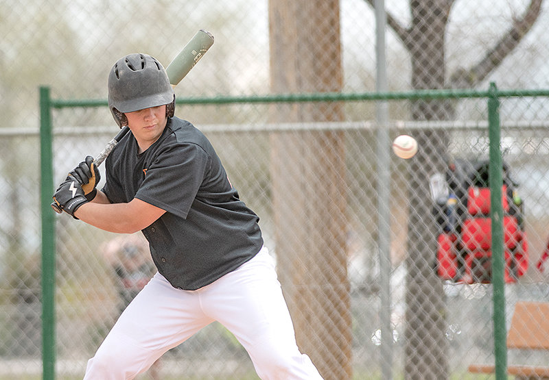 Aiden Greenwald prepares to swing at a pitch in a game against the Lovell Mustangs’ B team in May. Manager Tyler England said the team showed improvement throughout the season.