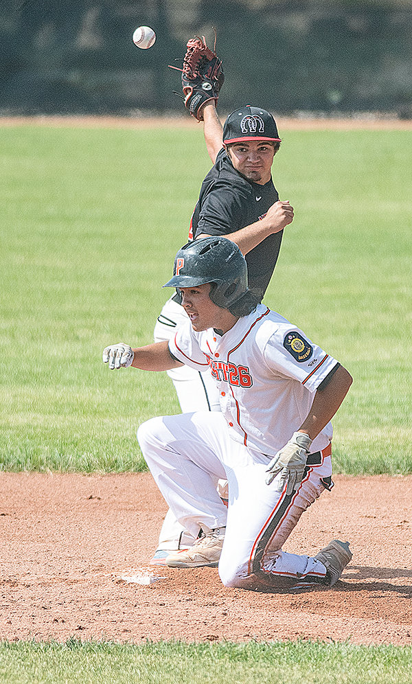 Kolt Flores slides safely into second base against the Lovell Mustangs on Sunday. Powell’s offense was strong for the majority of the district tournament, posting 46 runs in four games.