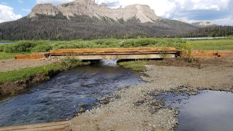 Thanks to funding from the Great American Outdoors Act, the Shoshone National Forest recently replaced this dilapidated bridge outside of Dubois (second photo) with a new structure (first photo).