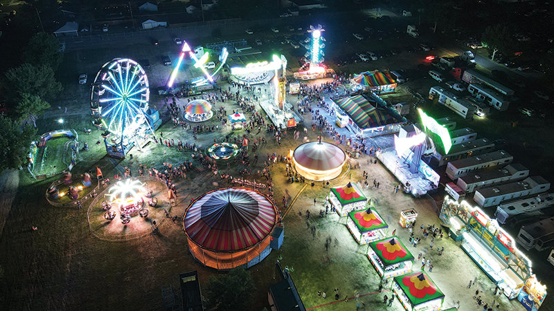 The Park County Fair’s midway and carnival lit up Powell’s skies Friday night, as crows returned to the fairgrounds after a COVID-disrupted 2020. This shot was captured from a drone flying 160 feet off the ground.