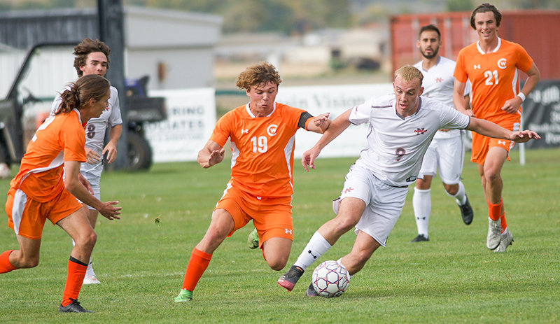 Thomas Mullen looks to break away from a Central Wyoming defender during a home matchup earlier this season. Mullen scored in the Trappers’ first round matchup against Casper, but NWC ultimately saw its season end in a 3-2 loss.