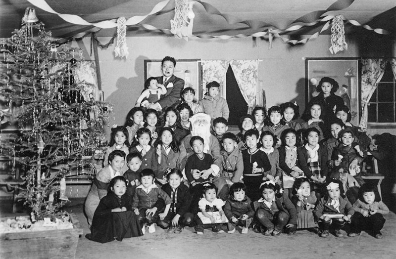 A children’s 1943 Christmas party at Heart Mountain is seen in this historic photograph. The Heart Mountain Interpretive Center, which tells the story of the people incarcerated at the relocation center during World War II, is hosting a pair of free holiday events.