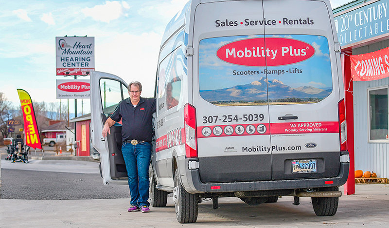Chris Pelletier climbs out of the new Mobility Plus company van used to help bring products to clients and for many of the company’s home services.