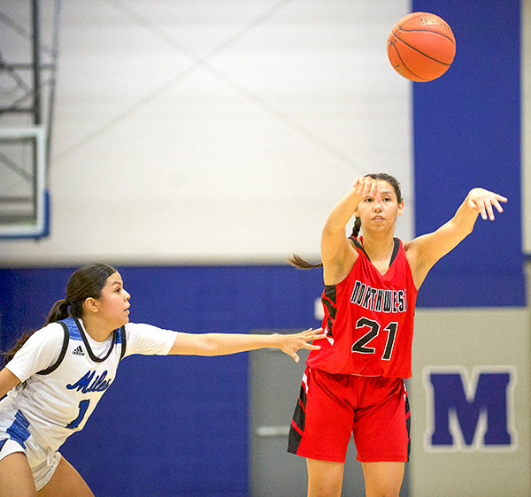 NWC freshman guard Nayeli Acosta throws a pass during the Trappers’ Nov. 18 matchup with Miles City. Northwest finished the weekend 0-3 after poor shooting performances doomed the women’s team.