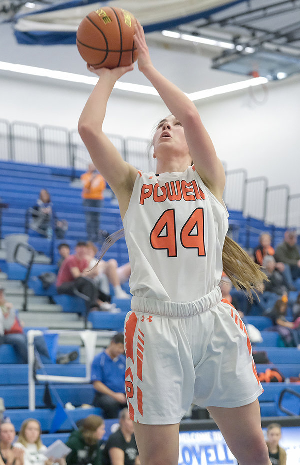 Powell High School junior Megan Jacobsen goes up for a layup during the Panther’s season opening win against Tongue River on Friday at the East/West Invitational in Lovell. The Panthers opened the season 2-1.