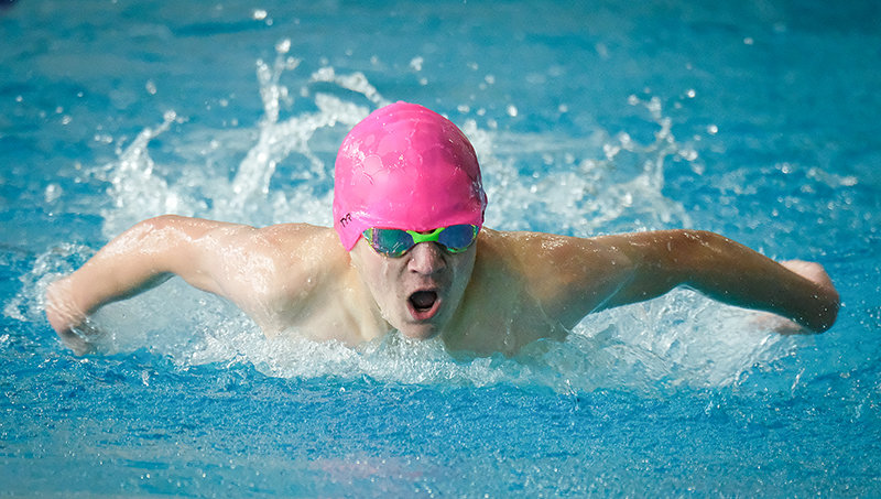 PHS sophomore Gabe Rose competes during the 100 fly on Saturday in Cody. Rose was one of seven Panthers who reached state qualifying marks during the first weekend of competition.