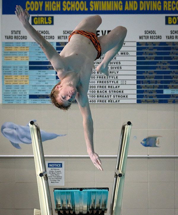 PHS senior Caiden Gerhts competes in diving at Saturday’s Cody Invitational. Gerhts reached a state qualifying mark in driving on Friday at the Powell Triangular, along with Jon Hawley and Ashtin Prentiss.