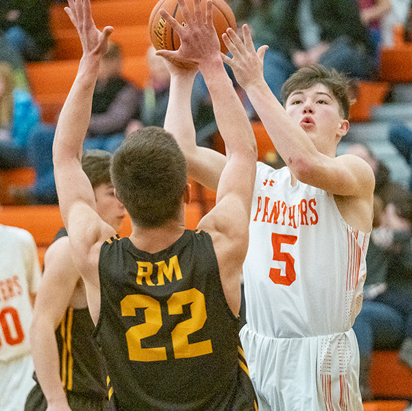 PHS sophomore Jhett Schwahn rises for a layup late in Saturday’s game against Rocky Mountain. The Panthers lost their fourth close game of the year, 38-37, against the Grizzlies.