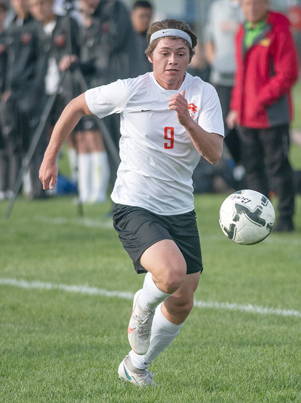 PHS senior Hawkin Sweeney moves the ball up the field during a match in Worland last spring. Sweeney is set to join the newly formed division II soccer program at Western Oregon University next fall.