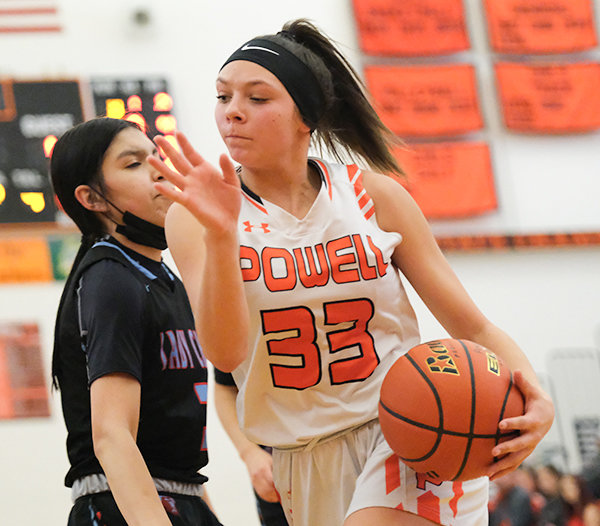 PHS freshman Catelynn Floy navigates past a Wyoming Indian defender during their semifinal matchup on Saturday. Floy finished with a game-high 19 points to help push the Panthers past the Lady Chiefs.