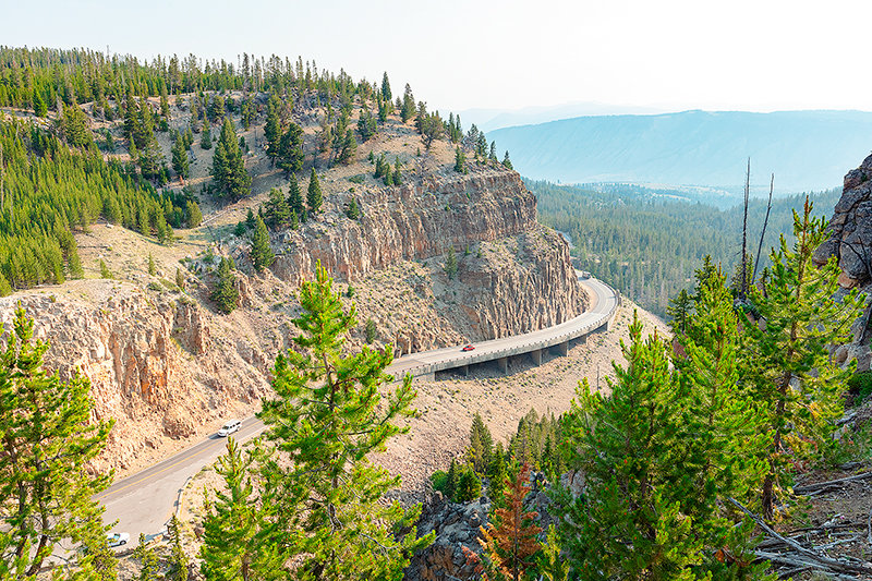 Automobiles travel through the scenic roadways in Yellowstone National Park recently. This year will mark the reopening of Tower Fall to Chittenden Road (near Dunraven Pass), a $28 million road improvement project completed over the past two years.