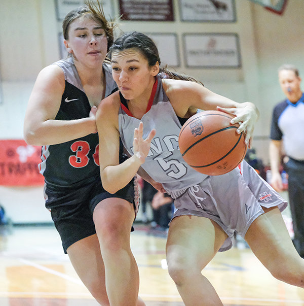 Coming out of the gates strong, NWC freshman Kiana Quintero drives to the basket during the first half of the Trapper’s game against Casper College. The TBirds used a strong third quarter to sink the Trappers as they dropped to 2-2 in region play on Saturday.