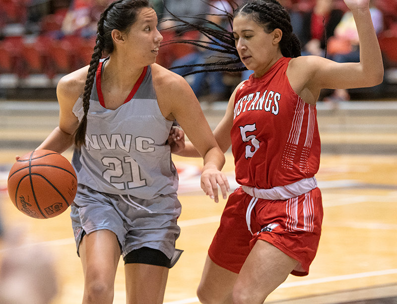 NWC freshman guard Nayeli Acosta looks for options as a Western Wyoming defender applies pressure. Acosta and the Trappers have the opportunity to earn the No. 2 seed in the Region IX tournament if they can beat LCCC and Central Wyoming on Wednesday, Saturday and Monday.