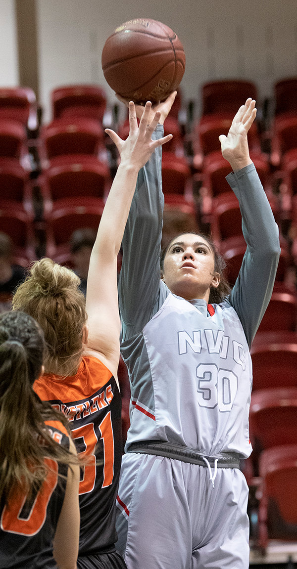 NWC freshman Darla Hernandez shoots a jumper over an outstretched Rustler arm in the Trappers’ regular season finale in February. Hernandez is anticipated to return next season along with Nayeli Acosta as the Trappers try to build on their mid-season turnaround.