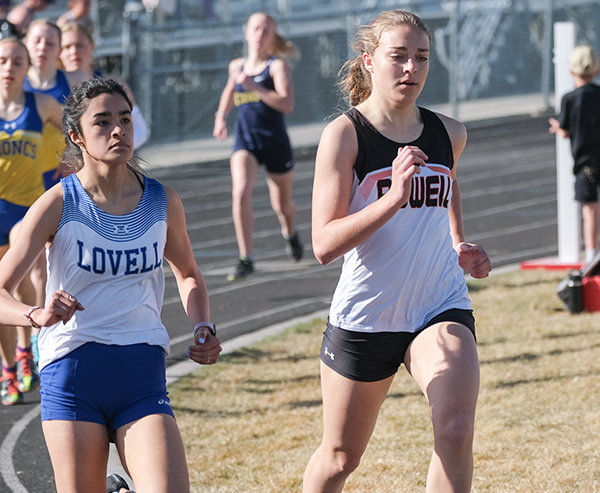 PHS junior Anna Bartholomew (right) pushes ahead of her competition en route to a third place in the 800 meters. She was also part of the third place 4x800 relay team on Saturday in Buffalo.