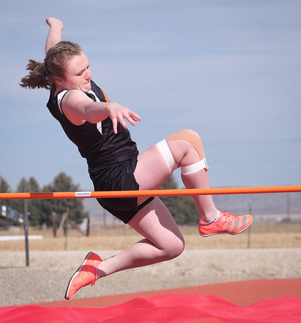 Katelynn Cook competes during the high jump on Saturday in Powell. She and the Powell Middle School eighth graders placed second as a team, just four points behind Cody in the opening meet.