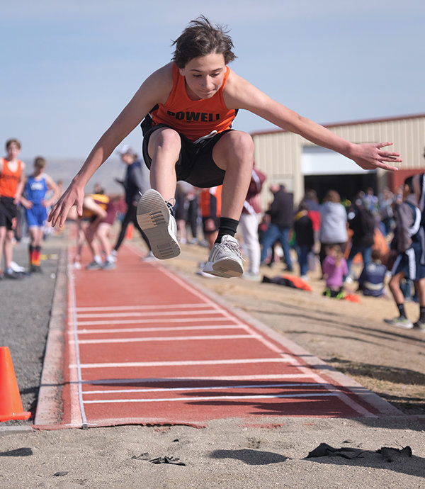 Seventh grader Jonathan Hine competes during the long jump on Saturday in Powell. Hine and the seventh grade boys ran away with the team competition, finishing with 130 points.