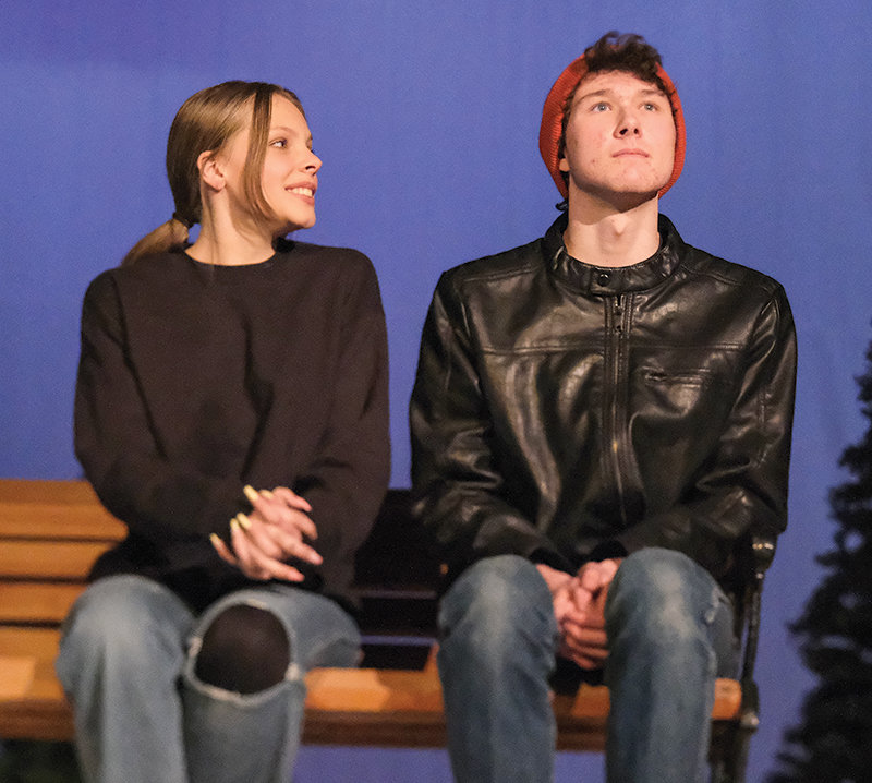 Kinsley Braten (at left) and Joe Bucher discuss their characters’ relationship in the opening scene of ‘Almost, Maine.’