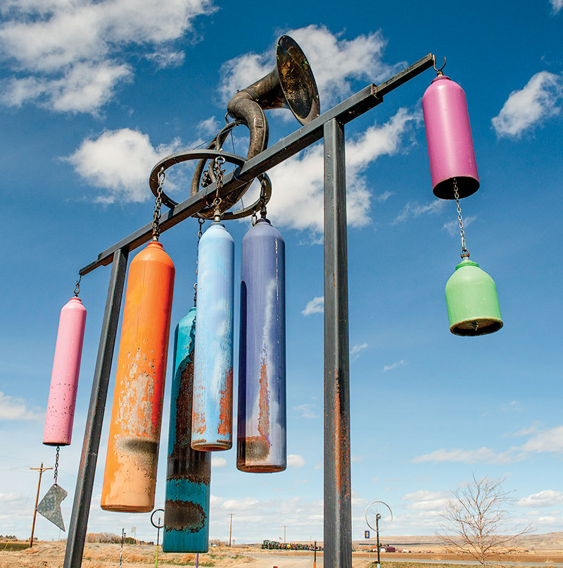 A massive wind chime, complete with an antique tuba, rings in beautifully rich tones in the winds common in the Heart Mountain area.