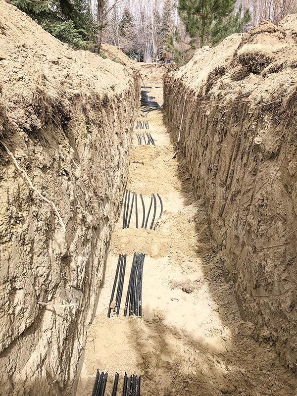 In order to install the geothermal heater Jerry Rodriguez had to dig a trench on his property that is approximately 80 feet long and 6 feet deep.