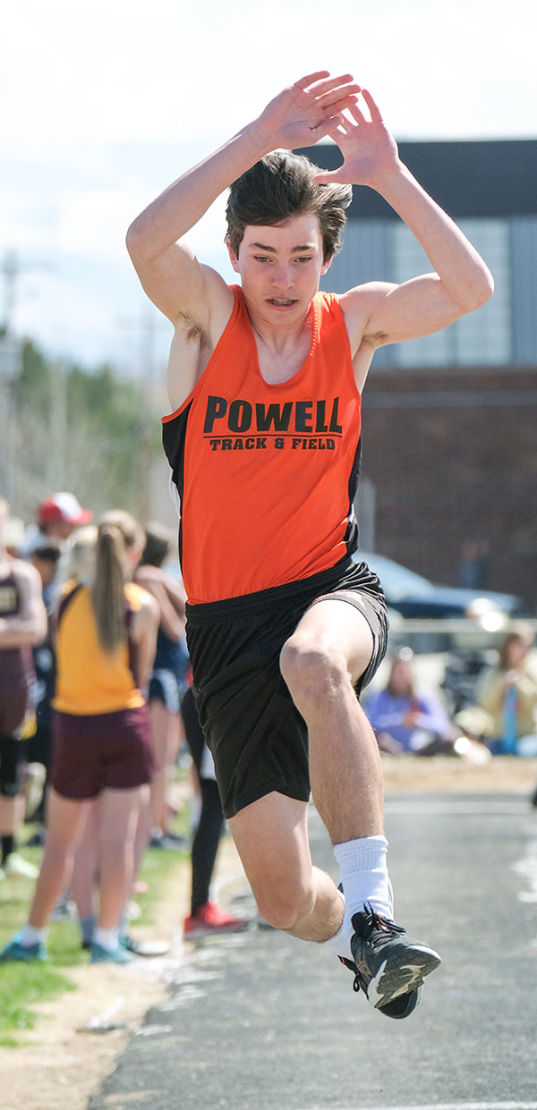 Caden Nelson puts all his effort into completing the second phase of the triple jump in Lovell on Saturday. The Cub boys’ track teams ran away from the competition, with both teams winning the title by more than 50 points.